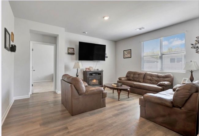 Large living room right off of dining and kitchen just adds to that wide open concept. More space than you can imagine here. | Image 12