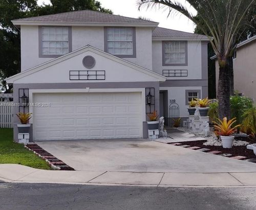 110 E Riverbend Dr, Sunrise, FL, 33326-2224 | Card Image