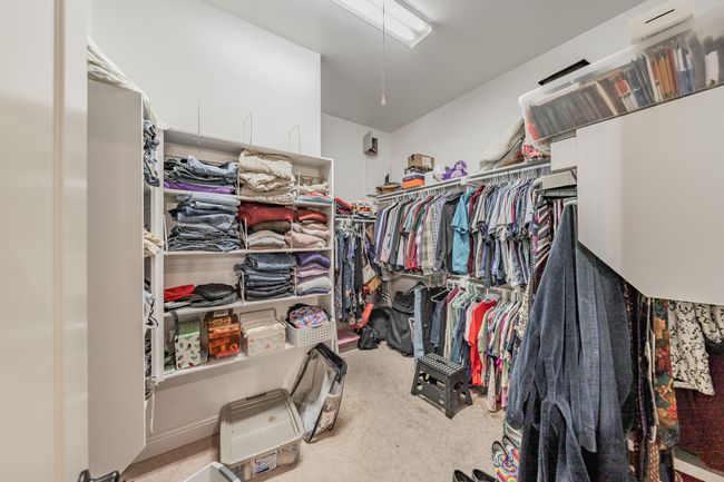 Spacious closet featuring carpet floors | Image 26