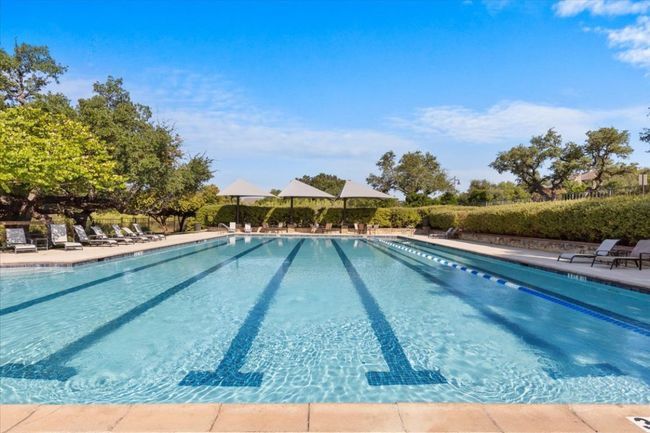 Community pool featuring a patio | Image 35