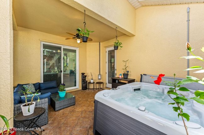 Screened in Patio with Hot Tub and covered Seating area | Image 12