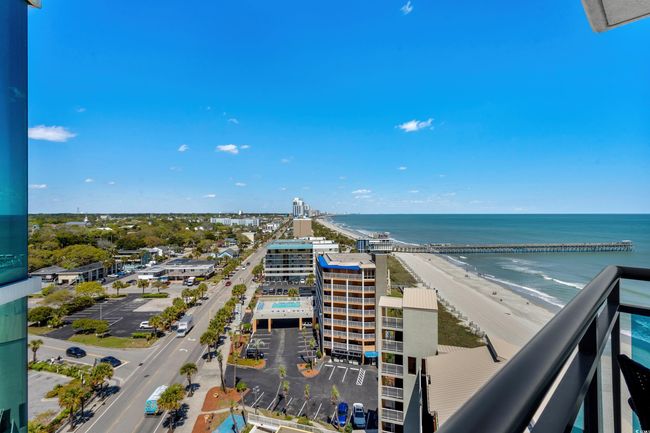 Exterior space featuring a city view, a view of the beach, and a water view | Image 33