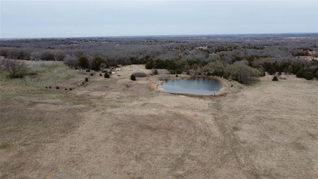 Birds eye view of property featuring a rural view and a water view | Image 43