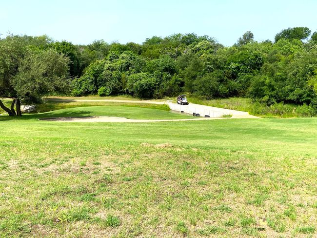 View of golf course from the back of the lot. | Image 4