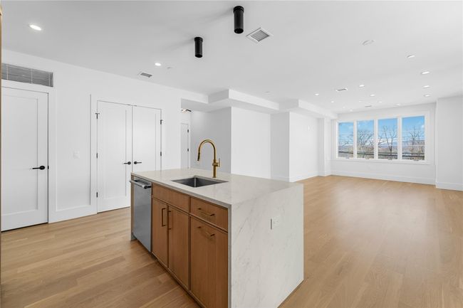 Open Concept Kitchen leading to Dining Room & Living Room | Image 4