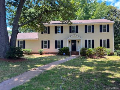 Colonial house with a front lawn | Image 1