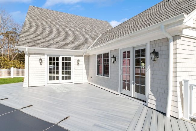 Wooden terrace featuring french doors | Image 7