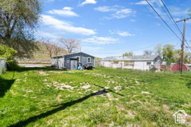 View of yard featuring an outbuilding | Image 31