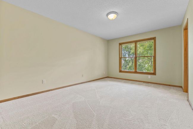 4th upper bedroom with new carpet and walk in closet | Image 39