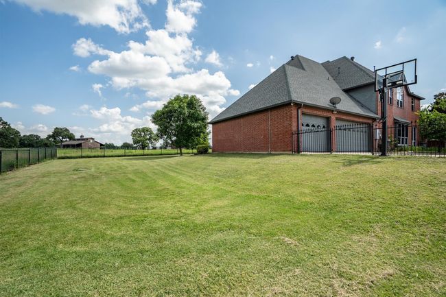 For added convenience, a massive 1, 200 sq. ft. garage provides ample space for vehicles, equipment, or additional storage needs. | Image 33
