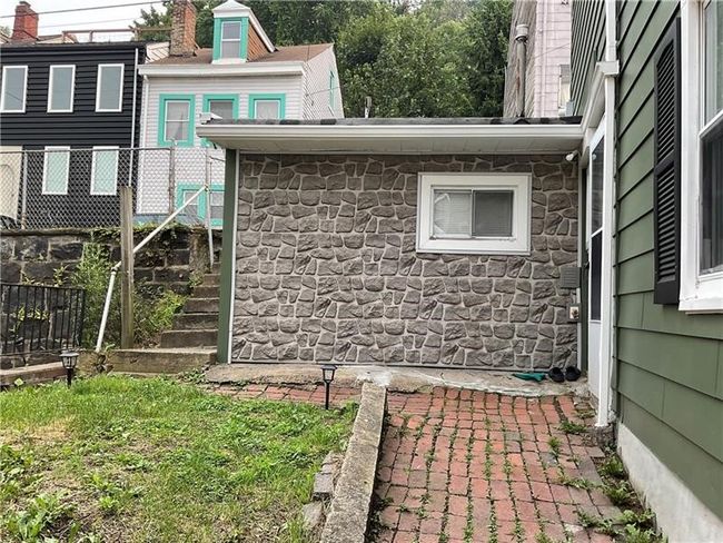 Newly redone stone wall & new windows | Image 21