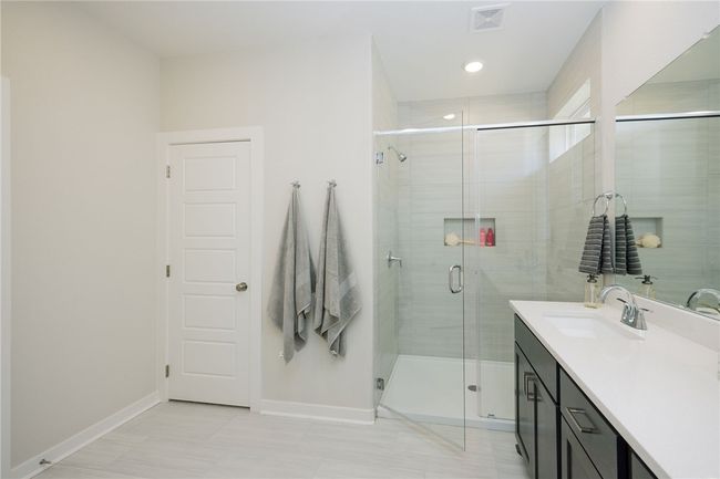 These photos showcase a previously finished Lea home. Please be aware that features, selections, and options may vary. For the most current information, contact your RNL Sales Executive to obtain the latest selections book and floorplan, which outlines the structural options available for this home. | Image 12