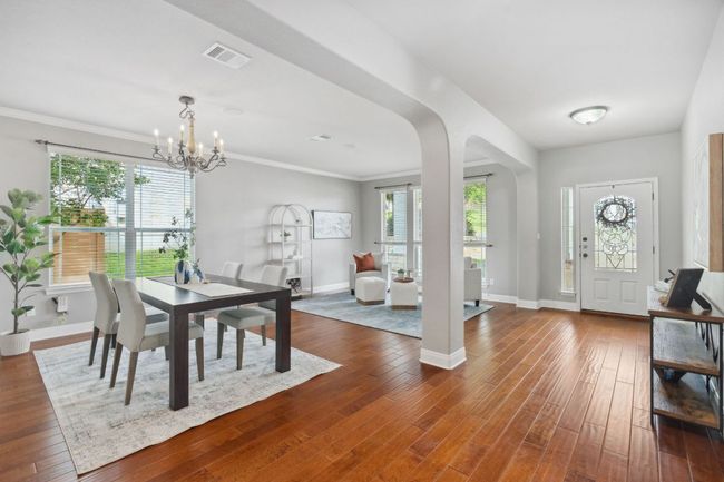 The formal dining and living room off the entry make for great additional living space. | Image 15
