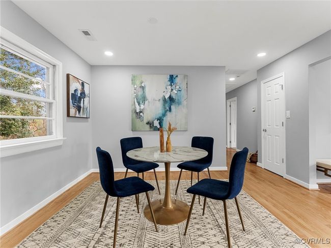 Dining space with recessed lighting, light wood-type flooring, visible vents, and baseboards | Image 22