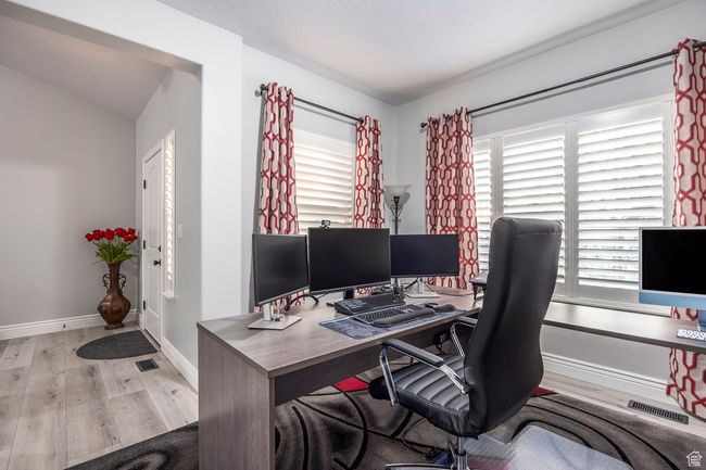 Office area featuring light wood-type flooring | Image 26