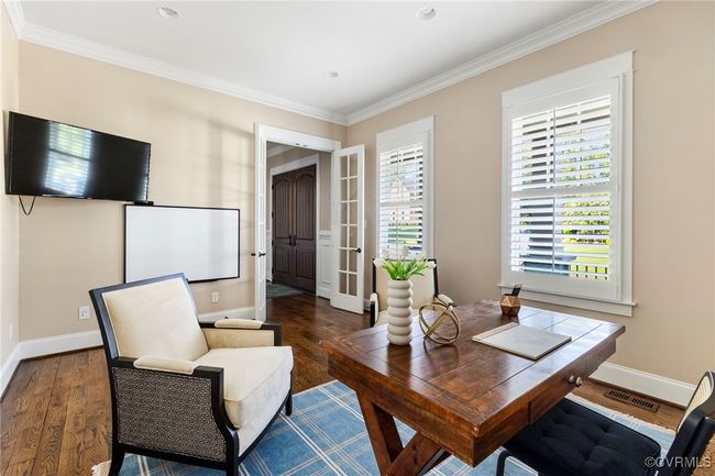 Office space with ornamental molding, french doors, wood finished floors, and recessed lighting | Image 5
