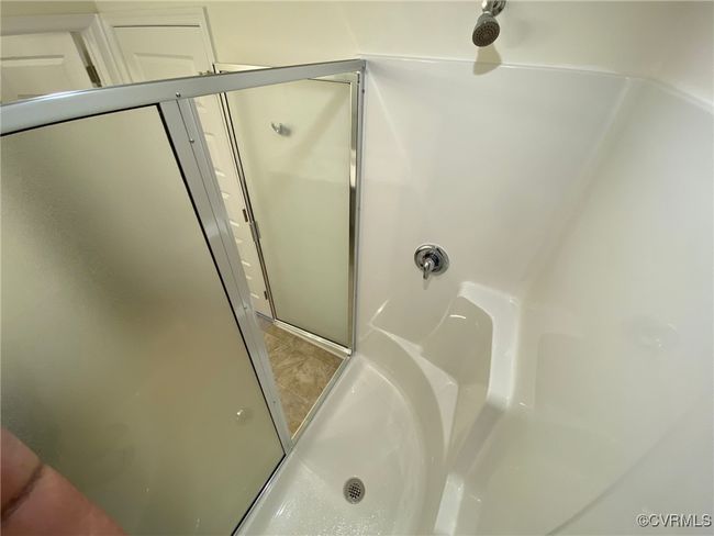 Bathroom with a shower with door | Image 22