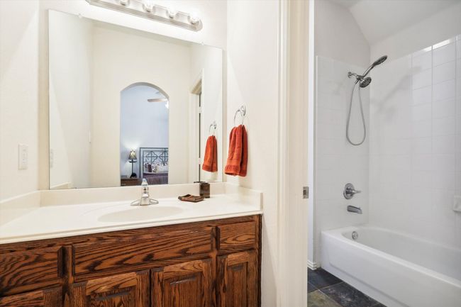 Upstairs Jack and Jill Bathroom with separate vanity areas for each bedroom | Image 23