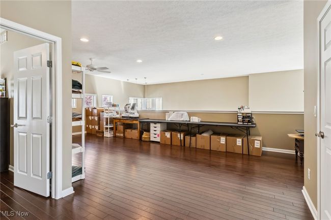 Open and versatile loft area with beautiful wood floors | Image 24
