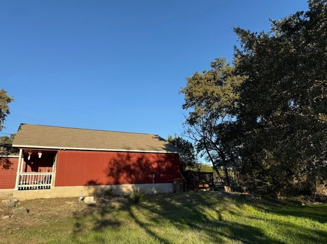 View of side of home with a yard | Image 15