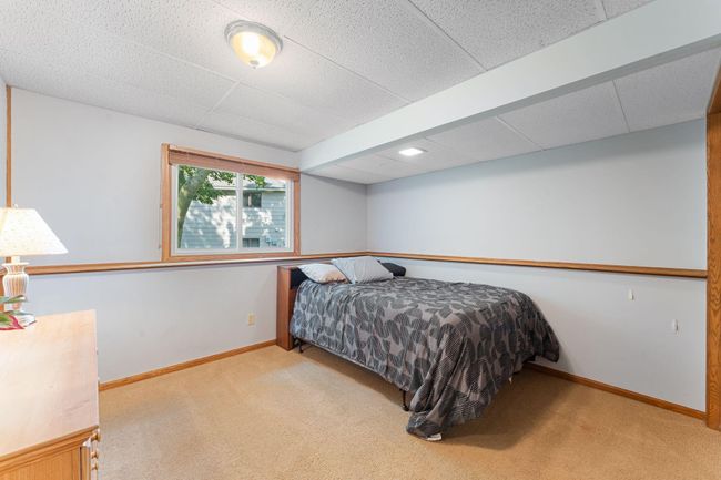 In the lower level you'll find a 4th bedroom. | Image 21