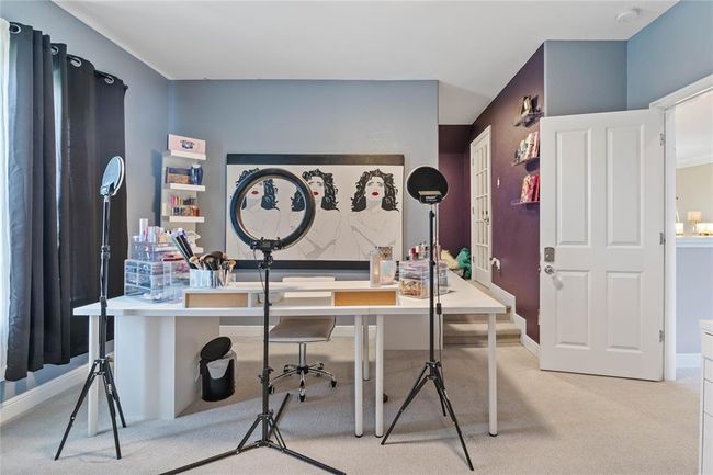 Secondary bedroom off of the game room with additional space. This space would make for perfect wine or whiskey room with the addition of a humidor case. | Image 35