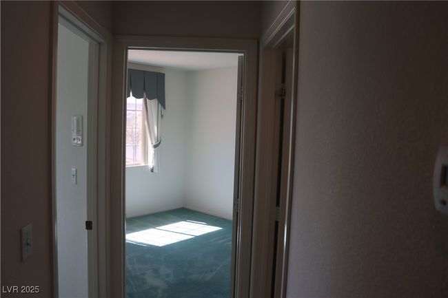 Corridor with carpet flooring | Image 50