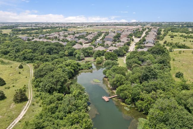 Aerial view of property's location with a nearby body of water | Image 40