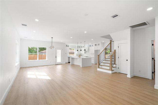 As you walk through the front door, you are greeted by wide open spaces | Image 5