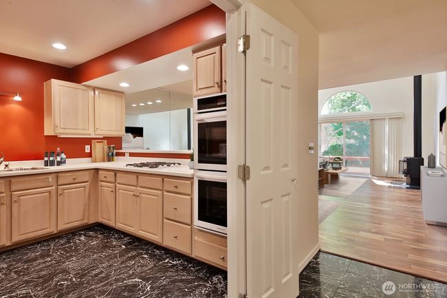 Marble floors. New double ovens and cooktop/downdraft. | Image 9