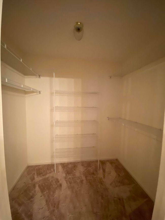Owners walk-in closet | Image 21