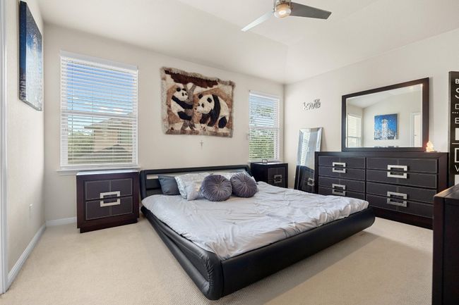 Upstairs you will find three bedrooms incuding this spacious primary suite which comes with two walk-in closets and a private ensuite bathroom. | Image 4