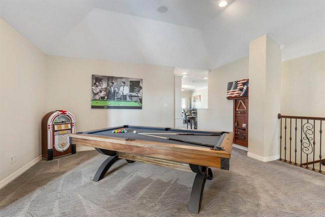Versatile Entertainment Space: Ideal for relaxation and play, featuring ample room for your favorite games and gatherings. | Image 28