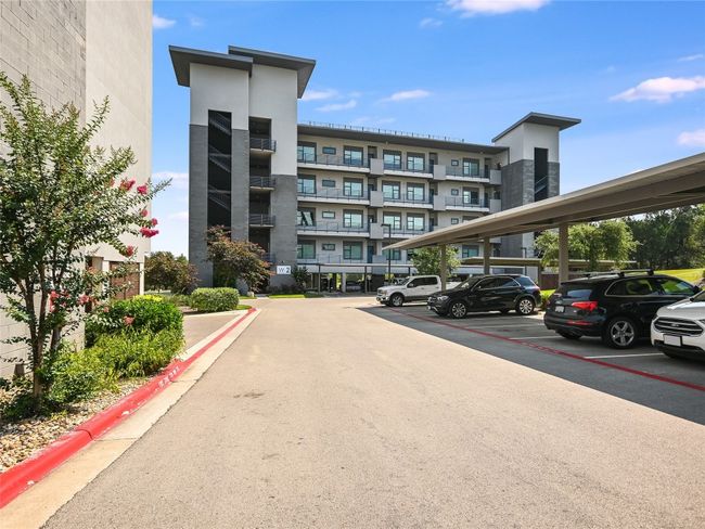 One reserved parking space in the under building garage, while guests can also enjoy covered parking. | Image 18