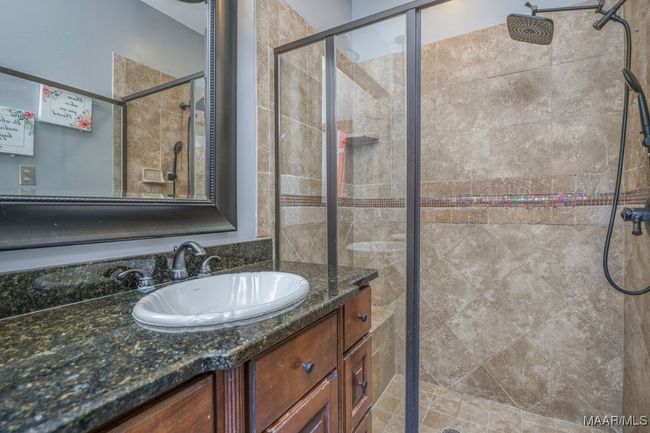 Double vanity sinks and a walk-in shower | Image 47