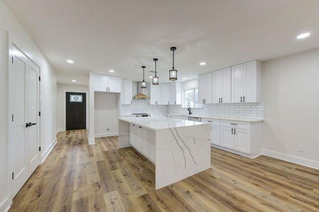 Kitchen towards the front of the home. | Image 9