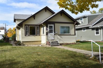 Bungalow-style house with a front yard | Image 1