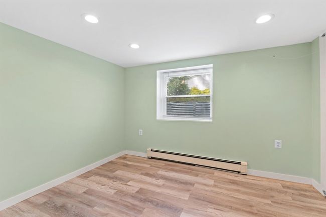 Spare room with recessed lighting, light wood finished floors | Image 23