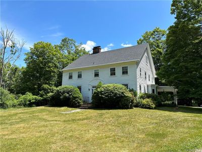 Rear view of house with a yard | Image 1