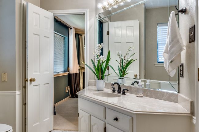 Bathroom with vanity and toilet | Image 16