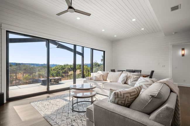 Large patio doors off of the living bring the outdoors in. | Image 14