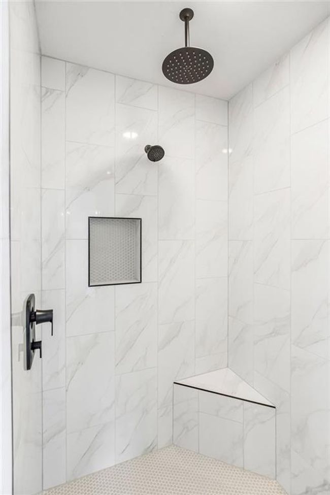 Bathroom featuring tiled shower | Image 23