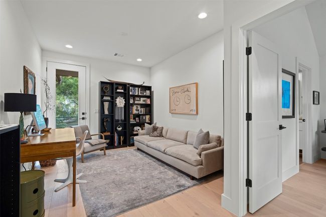 Office featuring light wood-type flooring and recessed lighting | Image 30