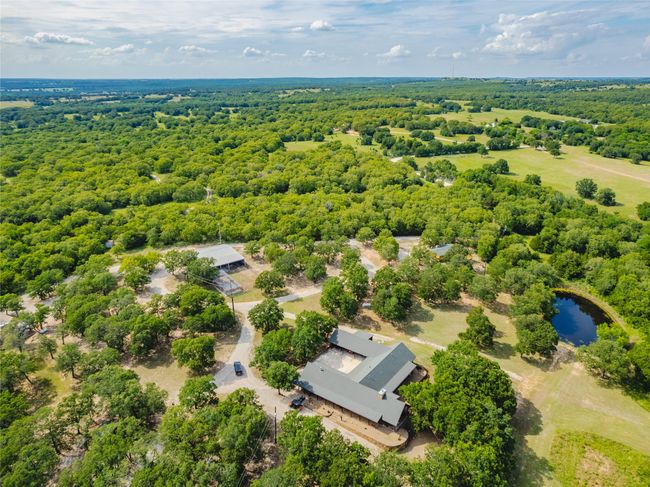 4 residences, barn, corrals and pens are situated on 5 manicured acres | Image 39