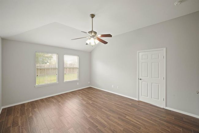 Another view of primary bedroom | Image 15