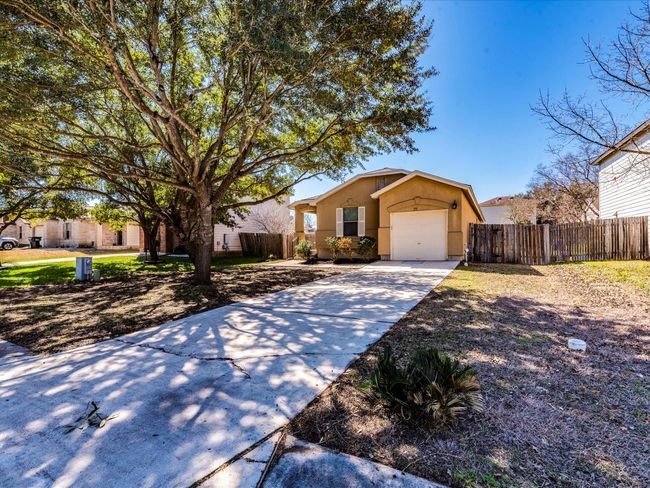 Fantastic location tucked in the back of the neighborhood on a street with two half-moon cul-de-sacs and sidewalks. | Image 8