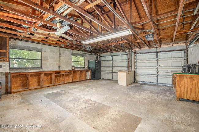 Large garage with shelving | Image 24