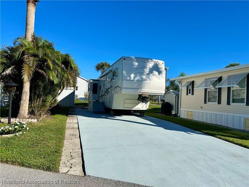 1112 Feather Ln, Bowling Green, FL, 33834-7045 | Card Image