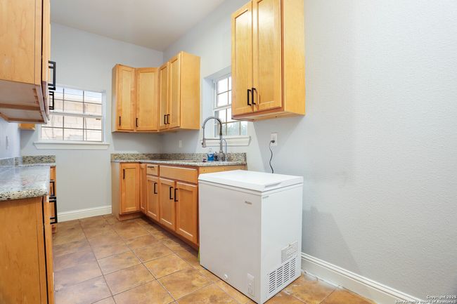 Kitchen in detached dwelling. | Image 32
