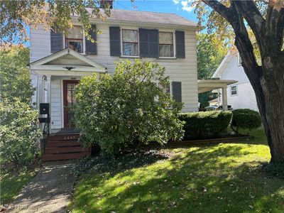 View of front of property featuring a front yard | Image 1